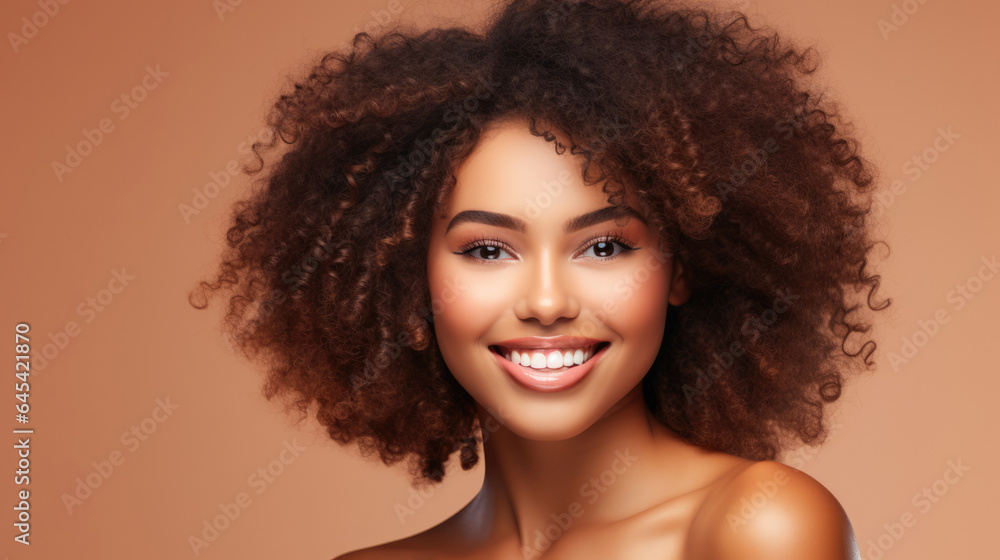 Beauty portrait of african american girl with clean healthy skin on beige background. Smiling dreamy beautiful black woman.Curly hair in afro style Beauty portrait of african american girl with clean healthy skin on beige background. Smiling dreamy beautiful black woman.Curly hair in afro style