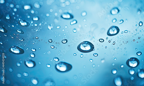 Close-up of clear blue liquid with shimmering droplets.