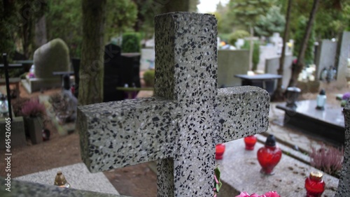 Stone Cross on Gravestone in Cemetery