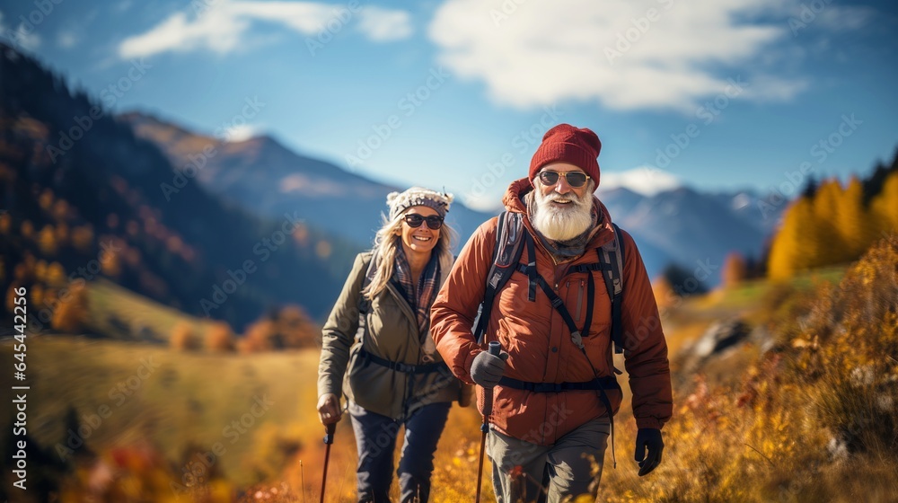 senior couple hiking outdoors in autumn