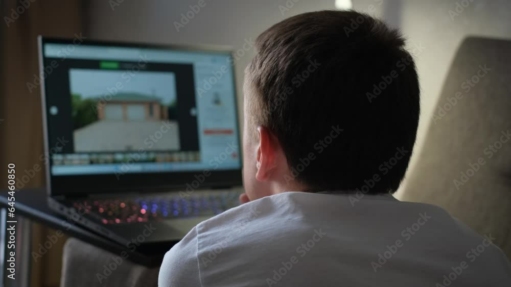 A man looks at advertisements for the sale or rental of housing on a laptop. A man looks at advertisements for the sale or rental of housing on a laptop.