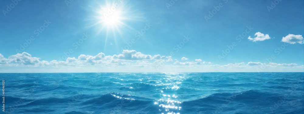 Fototapeta premium Blue ocean panorama with sun reflection, The vast open sea with clear sky, Ripple wave and calm sea with beautiful sunlight