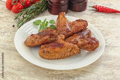 Roasted chicken wings with spicy sauce