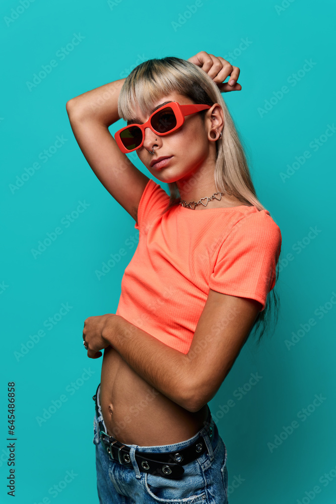 Confident trendy hipster woman in sunglasses Confident trendy hipster woman in sunglasses