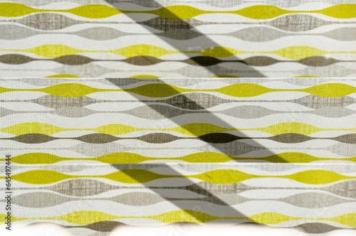 Obraz na plátně Fabric close-up of roller blind texture and shadows