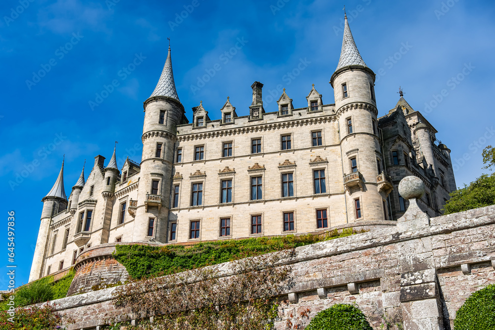 Medieval Dunrobin Castle rising majestically on a hill, Scotland, UK.