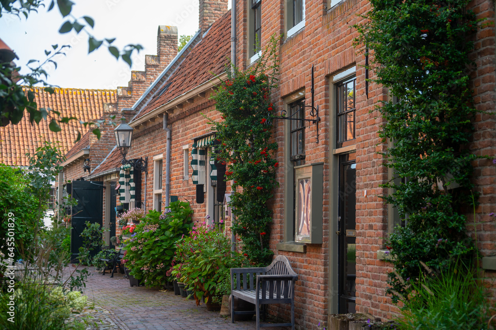 Naklejka premium Streets and houses of small historical town Buren in Gelderland, Netherlands in sunny day
