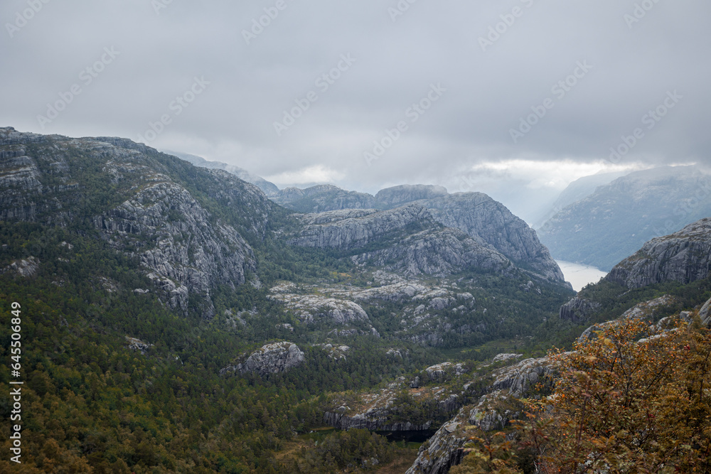 landscape with river and mountains on hike in Norway on fjord