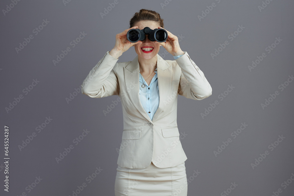 happy trendy small business owner woman in light business suit happy trendy small business owner woman in light business suit