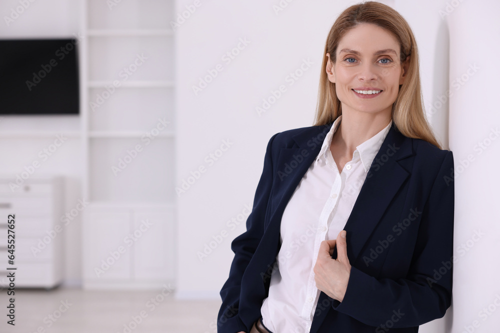 Happy real estate agent in new apartment. Space for text Happy real estate agent in new apartment. Space for text
