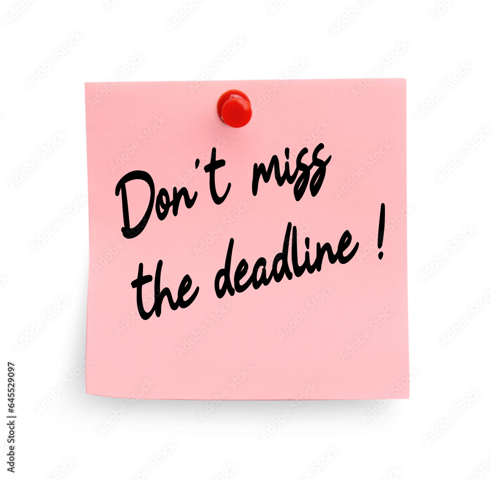 Note with reminder Don't Miss The Deadline attached to white wall Note with reminder Don't Miss The Deadline attached to white wall