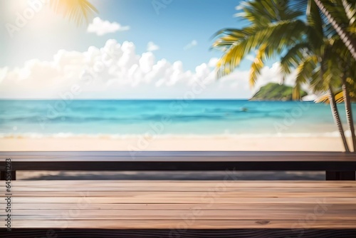 Top of wood table with seascape and palm leaves, blur bokeh light of calm sea and sky at tropical beach background.