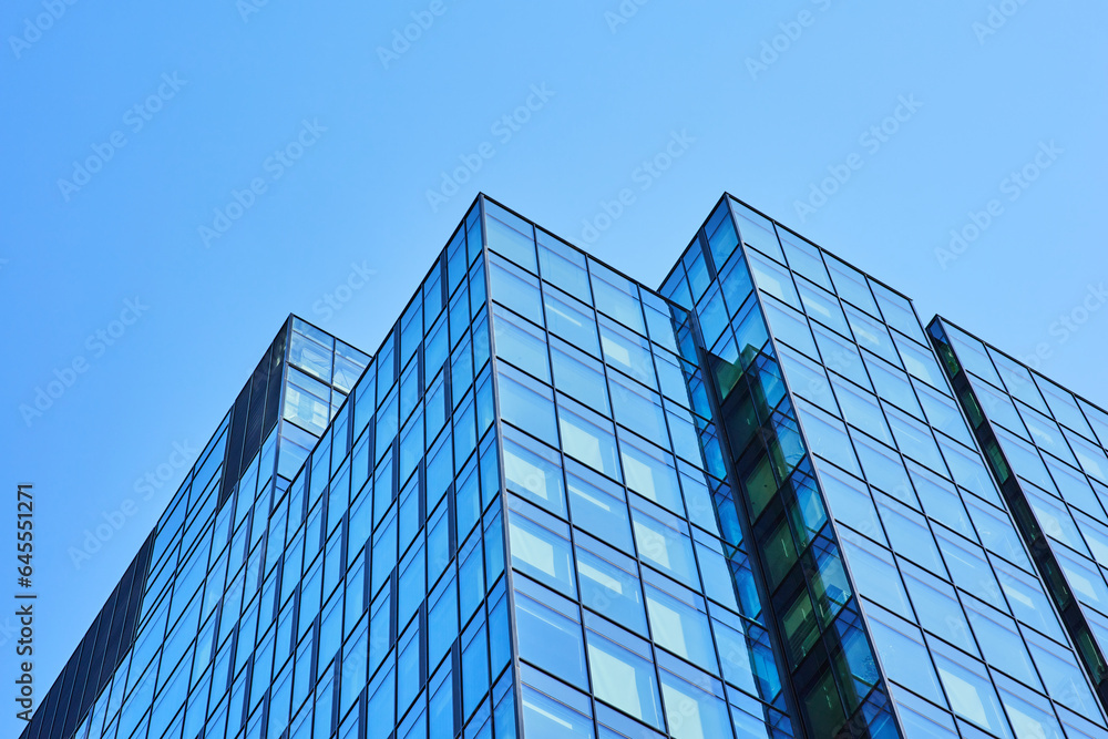 Modern office building. Architectural detail of modern building. Business concept of successful industrial architecture. - obrazy, fototapety, plakaty 