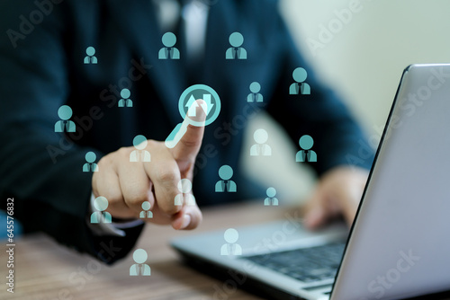 Bild auf Leinwand Hands of business people who examine and search for employees for the organization and transfer old employees in order to develop the organization to be strong