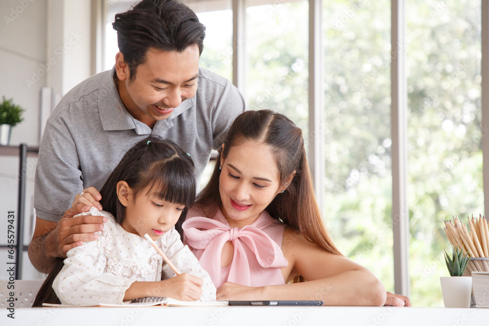 Real estate and mortgage concept : Family with child having activity in new home. Joyful first-time buyers in living room. Real estate, residential mortgage, moving into dream house. Real estate and mortgage concept : Family with child having activity in new home. Joyful first-time buyers in living room. Real estate, residential mortgage, moving into dream house.