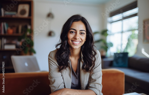 Smiling diverse businesswoman at her home