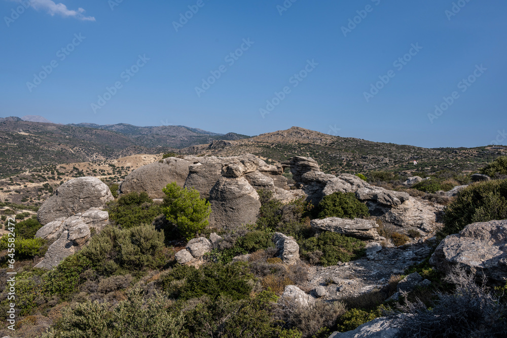 Beautiful and unusual rocks and mountains with a sunny summer day on the island of Crete