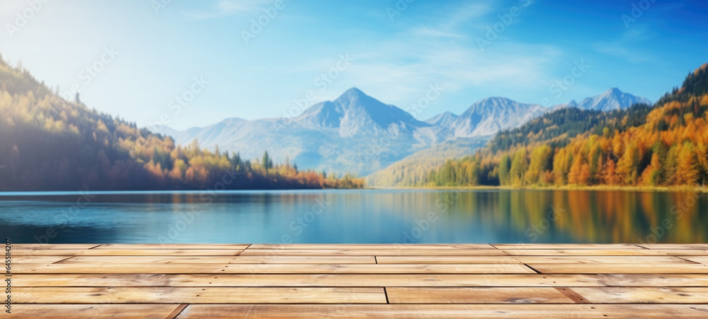 Empty wooden table rustic in front of Beautiful autumn mountain nature lake with blue sky background in the background with copy space, blank for text ads, and graphic design.