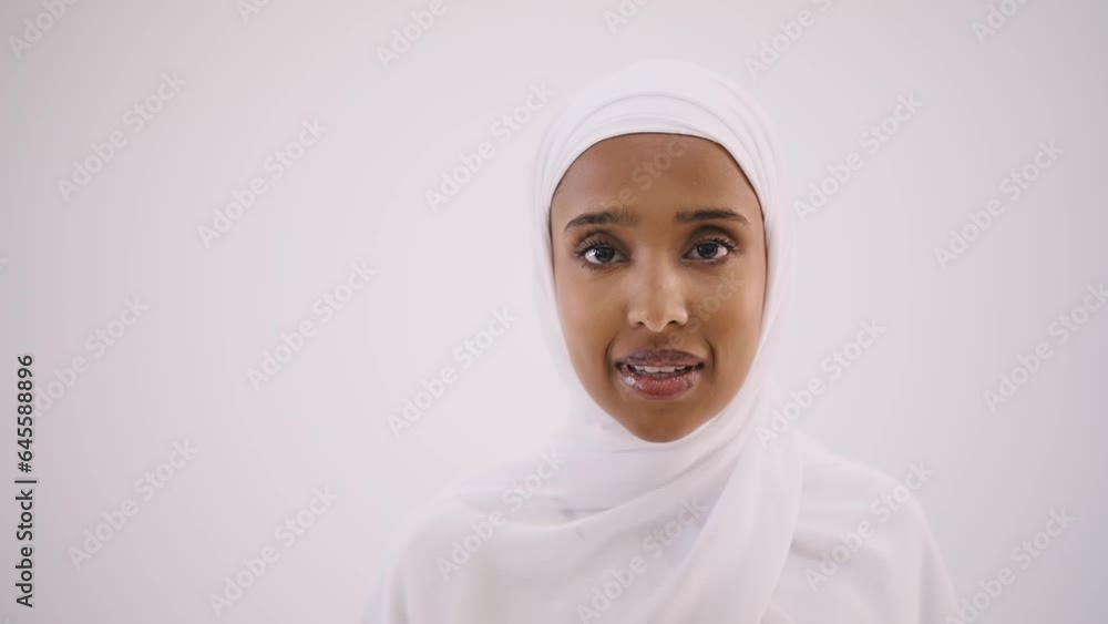Beautiful arab middle-eastern woman with traditional abaya dress in studio - Arabic muslim adult female portrait in Dubai, United Arab Emirates Beautiful arab middle-eastern woman with traditional abaya dress in studio - Arabic muslim adult female portrait in Dubai, United Arab Emirates