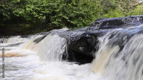 beautiful waterfall in the forest. Huai Chan Waterfall It is a beautiful waterfall in Sisaket Province, Thailand.