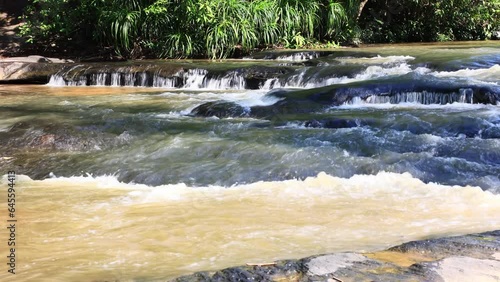 beautiful waterfall in the forest. Huai Chan Waterfall It is a beautiful waterfall in Sisaket Province, Thailand.
