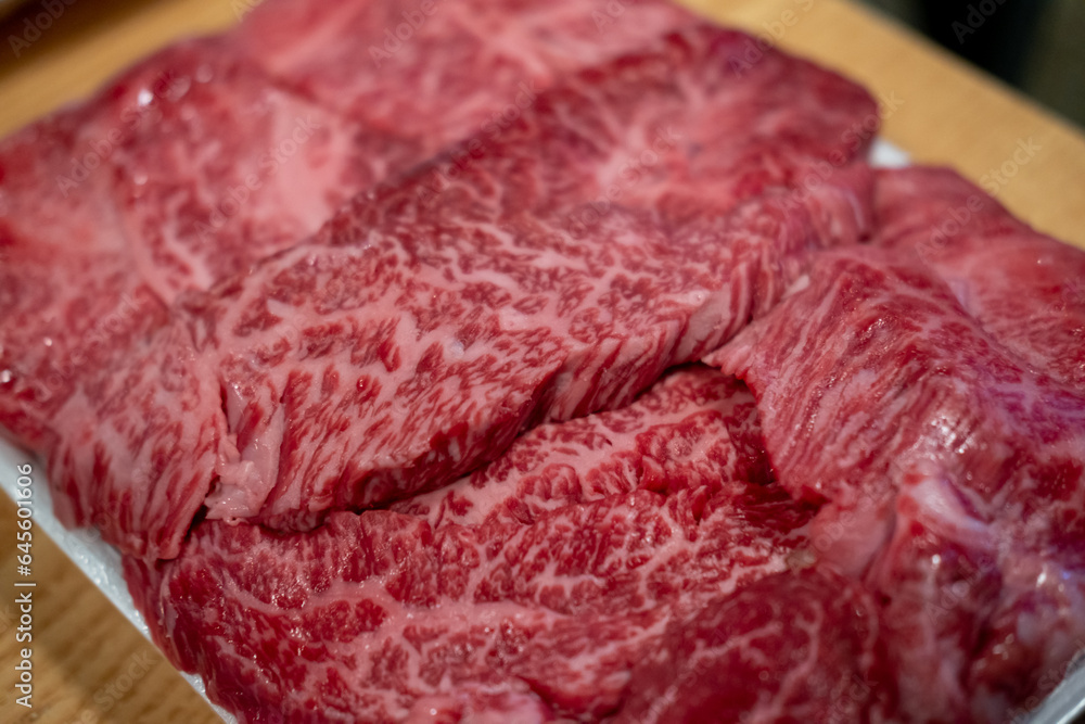 Obraz premium Close-up of rare meat, prepared for barbecue grill with soft focus