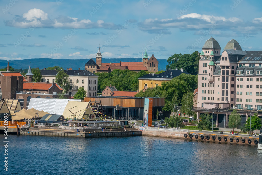 Stunning waterfront district of Bjørvika in Central Oslo, Norway. Situated in an inlet of the Oslofjord between Gamlebyen and Akershus Fortress.
