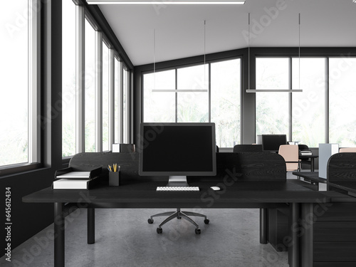 Office room interior with workplace, table and pc screen, panoramic window