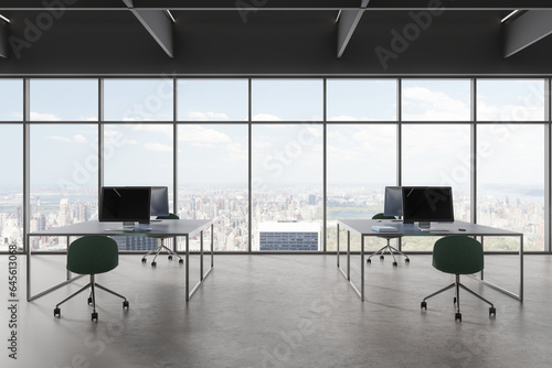 Gray panoramic office with green chairs