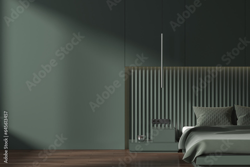 Green bedroom interior with blank wall © ImageFlow