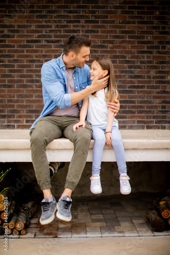 Father and his daughter hav...
