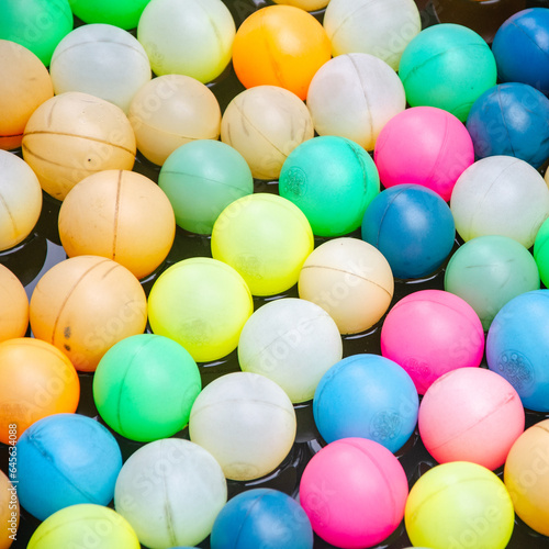 Colorful plastic floating balls. This is one of the favorite toys for children when swimming  bathing  or playing with water.