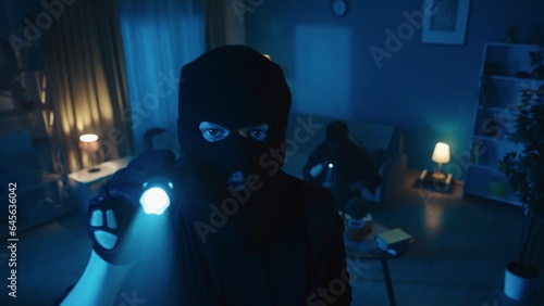 Photography Shot capturing two burglars robbing the apartmnet