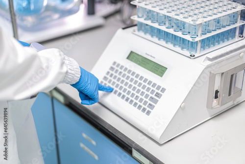 Wallpaper Mural Close-up on liquid medicine  production and focus on Pills During Enema Production and Packing Process on Modern Pharmaceutical Factory.  Concept of Medical Drug Manufacturing Pharma business line. Torontodigital.ca