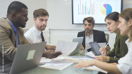 Wallpaper Mural Close up shot group of multiethnic business team sit and discuss the project in the conference room with graph result in the monitor. Torontodigital.ca