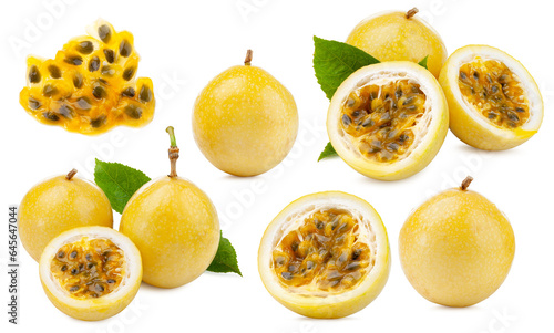 set of ripe yellow passionfruit with tasty pulp and leaves isolated on white background.