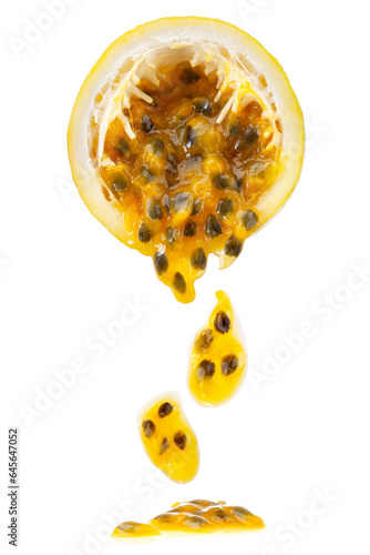 half of ripe yellow passionfruit with mixed tasty pulp isolated on white background.