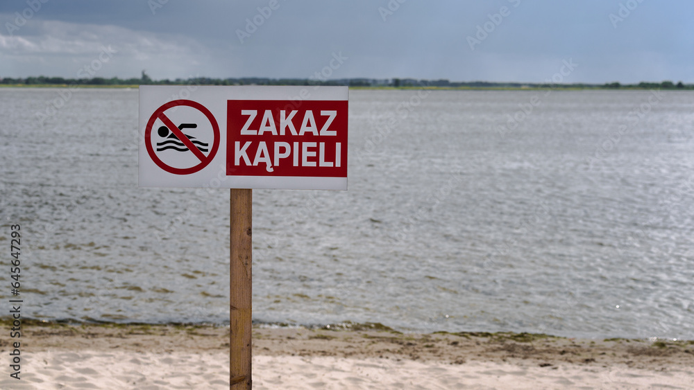 SAFETY ON THE WATER - Warning sign on the shore of the lake with the words 