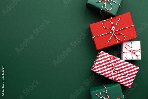 Gift boxes on color background, flat lay, space for text