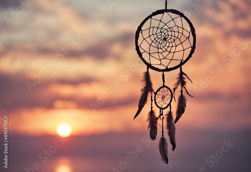 Dreamcatcher sunset sky, boho chic, ethnic amulet symbol Indigenous Peoples Day and Native Americans Day