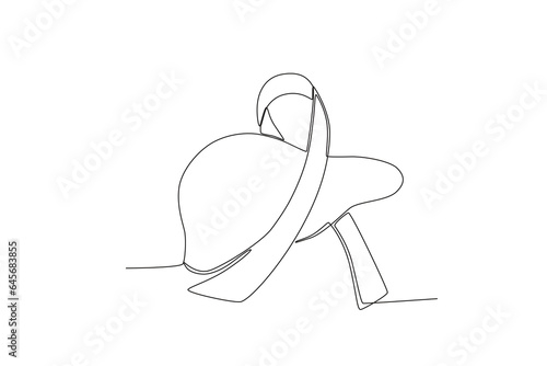 One continuous line drawing of the ribbon and the concept of world hepatitis day
