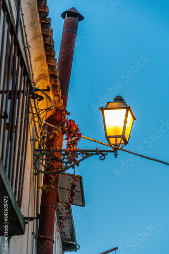 Caratteristico lampione di un borgo antico photo