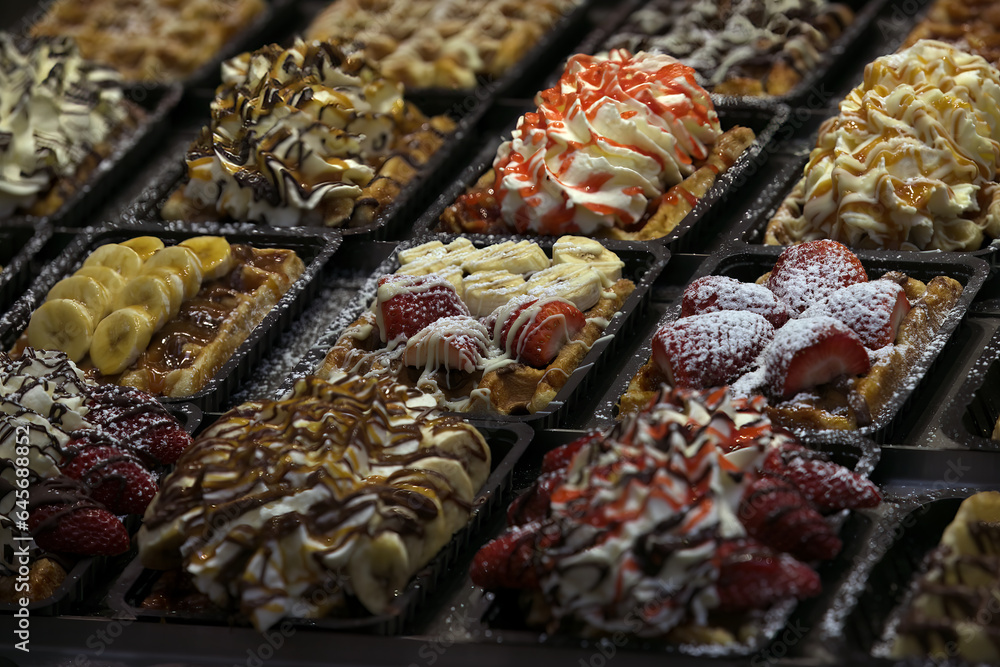 Brussels' Sweet Symphony: Assorted Belgian Waffles Topped with Fruits