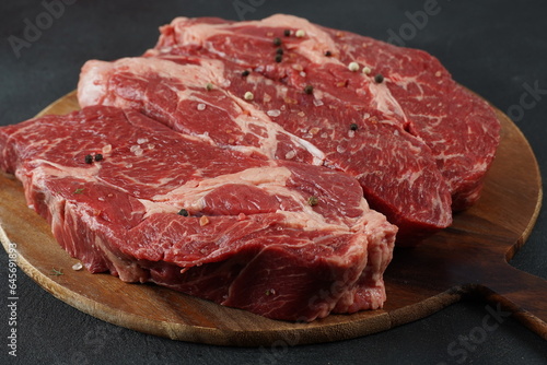 Plain fresh cut chuck steak prepared for cooking