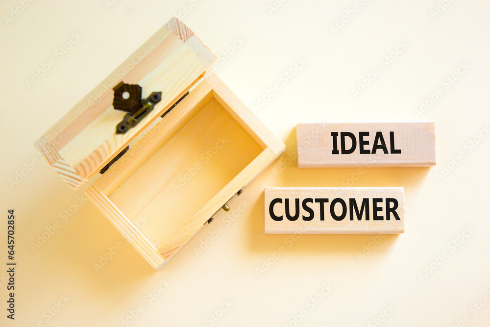 Ideal customer symbol. Concept words Ideal customer on beautiful wooden blocks. Beautiful white table white background. Empty wooden chest. Business ideal customer concept. Copy space. Ideal customer symbol. Concept words Ideal customer on beautiful wooden blocks. Beautiful white table white background. Empty wooden chest. Business ideal customer concept. Copy space.