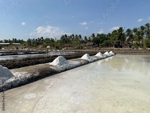 view of salt production on the seafront photo