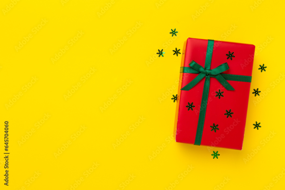 Creative handmade christmas gift box with decor on color background, top view Creative handmade christmas gift box with decor on color background, top view
