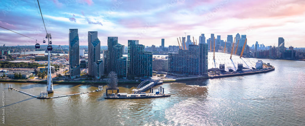 Thames river Greenwich Peninsula and Canary Wharf in London panoramic view from cable car