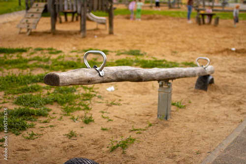 Rocking-balancer made of wood on the playground