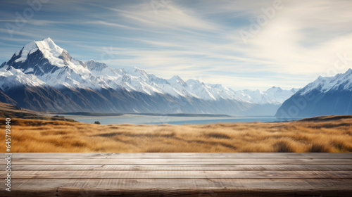 Empty wooden table top with blur background of mountain landscape